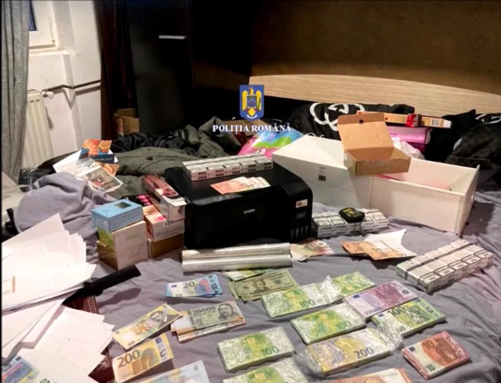 Percheziții în Arad și alte opt județe, la persoane bănuite de contrafacere a bancnotelor
